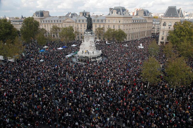 Hundreds of people gather on Republique square during a demonstration in Paris. AP Photo