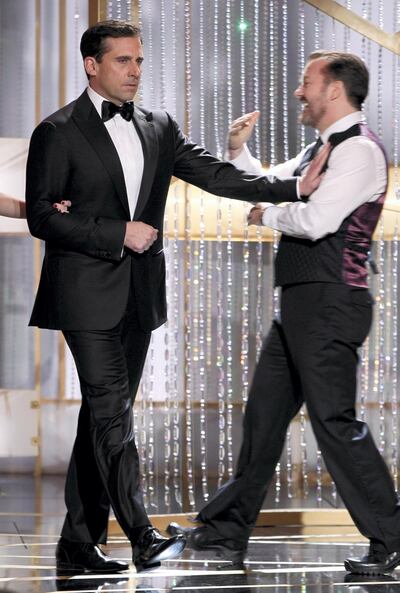 68th ANNUAL GOLDEN GLOBE AWARDS -- Pictured: (l-r) Steve Carell, Ricky Gervais on stage during the 68th Annual Golden Globe Awards held at the Beverly Hilton Hotel on January 16, 2011  (Photo by Paul Drinkwater/NBCU Photo Bank/NBCUniversal via Getty Images via Getty Images)