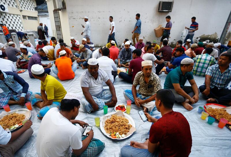 Bangladeshi migrant workers prepare to break fast in Singapore. Reuters