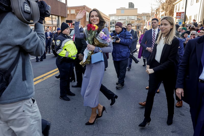 The Princess of Wales waves to the crowd after visiting the Centre on the Developing Child at Harvard University in Cambridge, Massachusetts. AP