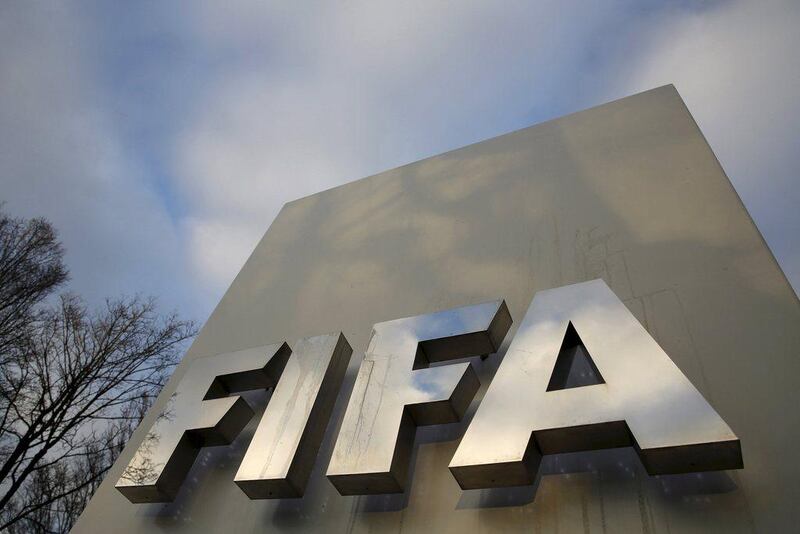 A FIFA sign is seen outside the FIFA headquarters in Zurich, Switzerland, in this file picture taken December 17, 2015. Soccer's governing body FIFA said on March 16, 2016 that members of its executive committee had in the past sold their votes in World Cup hosting contests, including for the tournament held in South Africa in 2010. REUTERS/Ruben Sprich/Files