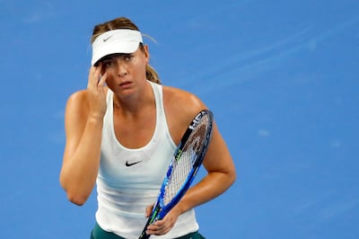 Maria Sharapova of Russia reacts after losing a point to Simona Halep of Romania during their women's singles match in the China Open tennis tournament at the Diamond Court in Beijing, Wednesday, Oct. 4, 2017. (AP Photo/Andy Wong)