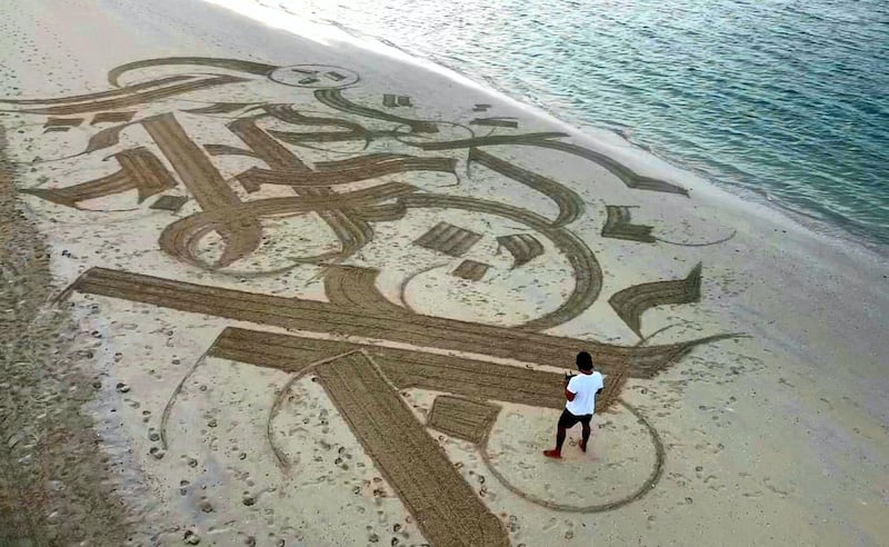 Dubai, United Arab Emirates - Reporter: N/A. Features. Sand artist Nathaniel Alapide draws murals on the beach using a rake in Jebel Ali. Tuesday, November 3rd, 2020. Dubai. Courtesy of Nathaniel Alapide

Please don't use for a standalone planned feature for early December

