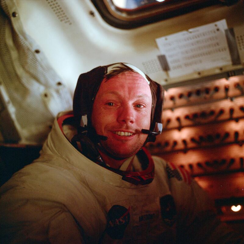 Armstrong sits inside the Lunar Module after he and Buzz Aldrin completed their extravehicular activity on the surface of the moon. NASA / AP