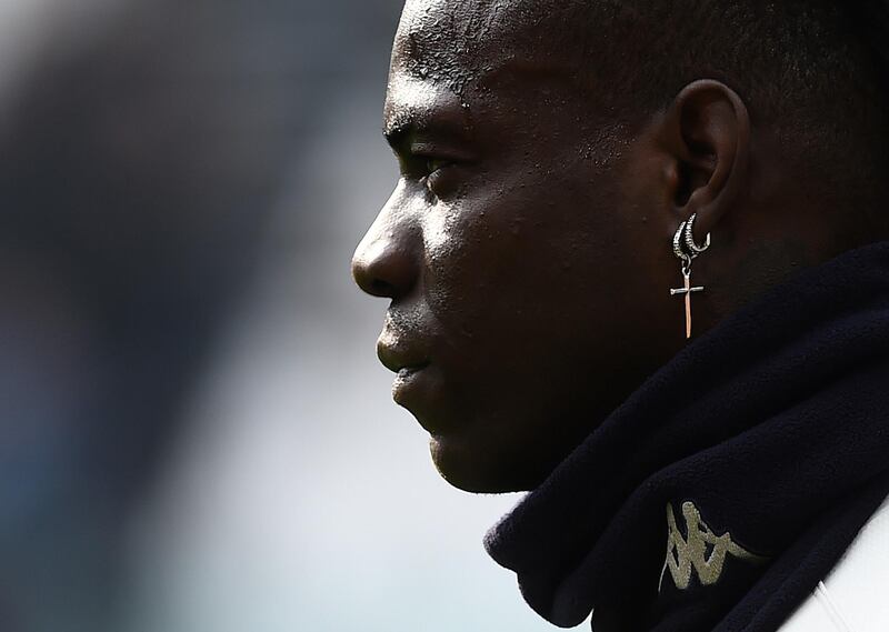 Brescia's Mario Balotelli warms up before the match against Juventus. Reuters