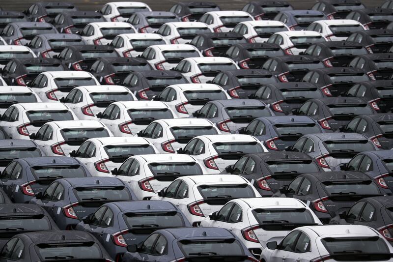 New cars at the port in Southampton. The number of cars built in the UK last year fell to the lowest total since 1956, the Society of Motor Manufacturers and Traders said. PA