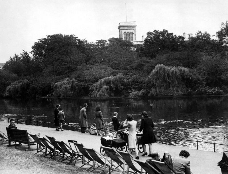 St James's Park, showing the lake and the Island Bird Sanctuary. It has been announced that Mr Hugh Edmund Watts, Chief Inspector of Explosives at the Home Office, has been awarded the George Medal for opening, examining and dismantling a large number of bombs that had been sent to prominent people through the post. When somebody, such as Mr Ernest Bevin, received a bomb parcel, Mr Watts would go out on to the island in a solid built concrete hut, clang a steel door behind him, and get to work on the bomb. London, 3rd August 1948. (Photo by Eric Harlow/Mirrorpix/Getty Images)