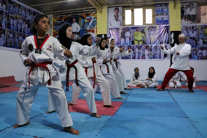 Afghan girls practice Taekwondo during a martial-arts class in Herat, Afghanistan, on Tuesday, February 16. EPA