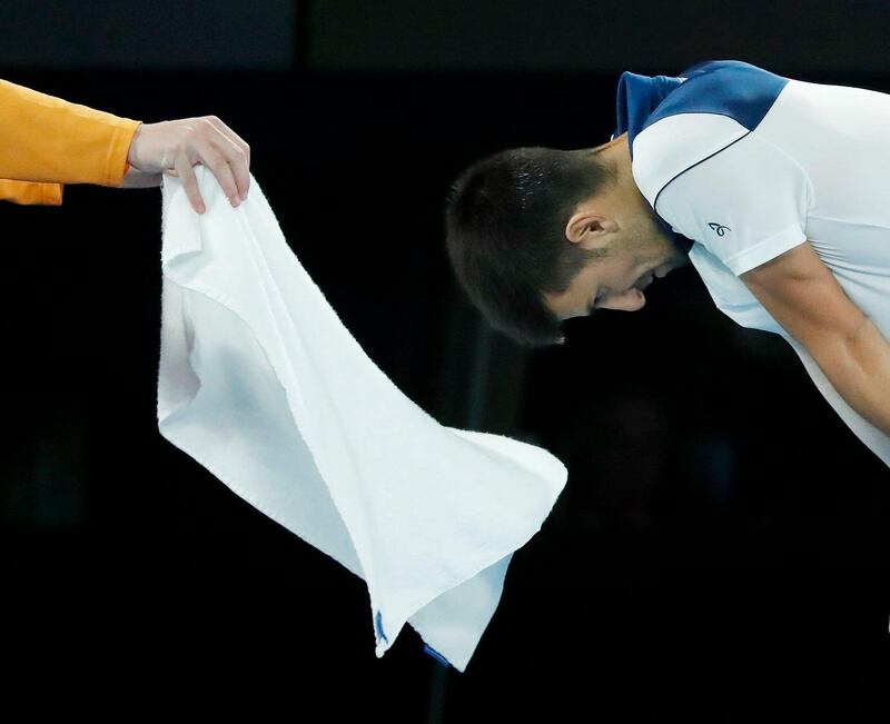 epa06464542 Novak Djokovic of Serbia reacts during his fourth round match against Chung Hyeon of South Korea at the Australian Open Grand Slam tennis tournament in Melbourne, Australia, 22 January 2018.  EPA/MAST IRHAM