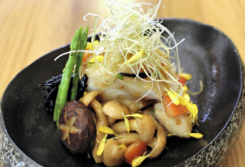 Entrée: Chilean sea bass with truffle ponzu, shimeji mushroom and hijiki asparagus; Dh30 from Cafe Sushi