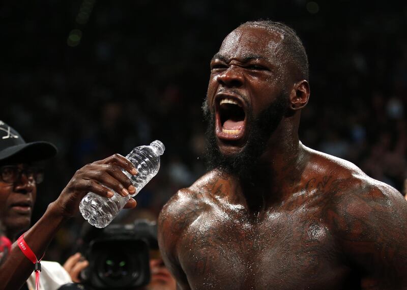 WBC heavyweight champion Deontay Wilder celebrates after knocking out Luis Ortiz. AFP