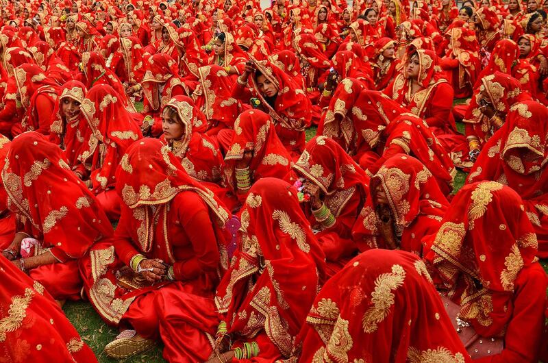 Indian Muslim brides-to-be gather as they participate in a mass wedding ceremony in Ahmedabad. AFP