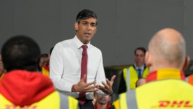 Prime Minister Rishi Sunak visits a DHL depot in Essex, where he told workers he was concerned by the rise in younger people 'trapped on benefits'. Getty Images
