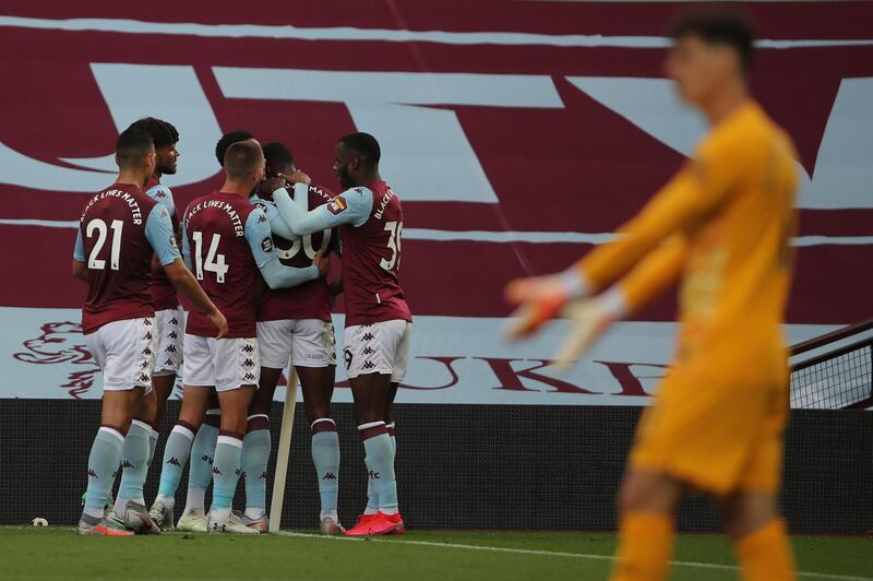 Aston Villa players celebrate after Kortney Hause scored his side's opening goal at Villa Park. AP