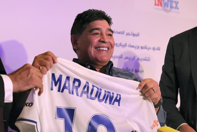 ABU DHABI , UNITED ARAB EMIRATES , MAY 22 – 2018 :- Diego Maradona , Chairman of FC Dynamo Brest holding FC Dynamo Brest shirt during the press conference held at Emirates Palace hotel in Abu Dhabi.  ( Pawan Singh / The National )  For Sports. Story by John