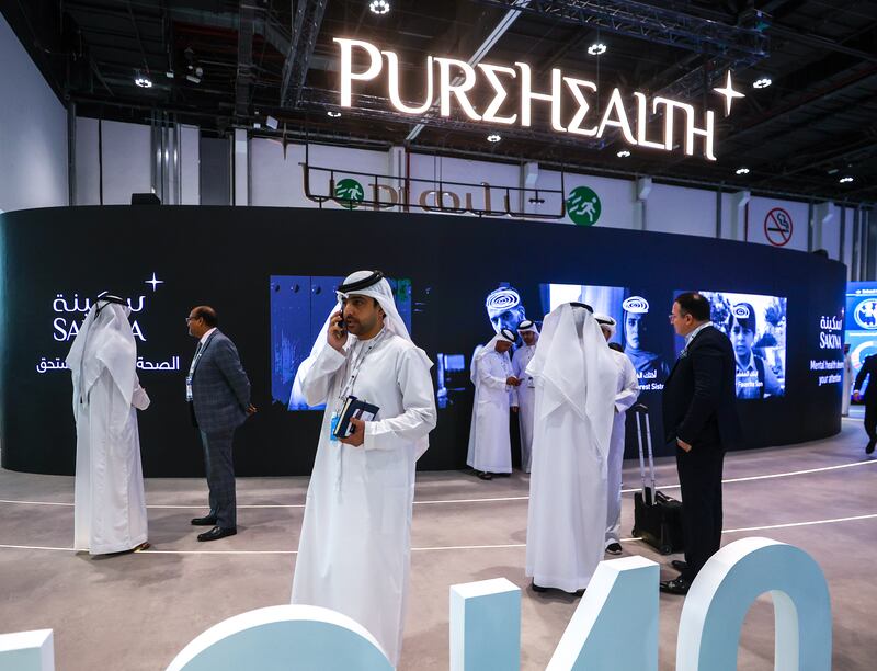 Delegates and visitors gather for the event in the UAE capital.