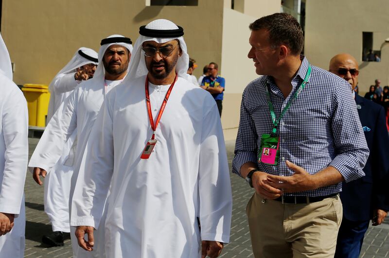 Formula One - F1 - Abu Dhabi Grand Prix - Yas Marina Circuit, Abu Dhabi, United Arab Emirates - November 25, 2017. Crown Prince of Abu Dhabi, Sheikh Mohamed bin Zayed Al Nahyan (C) arrives at the Yas Marina Circuit. REUTERS/Hamad I Mohammed