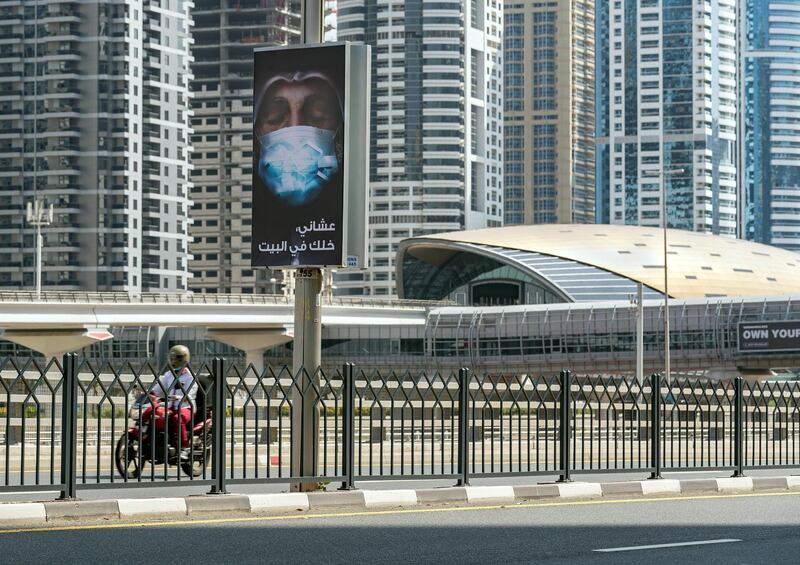 Dubai, United Arab Emirates - Reporter: N/A: Photo Project. Artist Maitha Demithan has her work show all over Dubai to encourage people to stay at home. Thursday, April 15th, 2020. The Marina, Dubai. Chris Whiteoak / The National