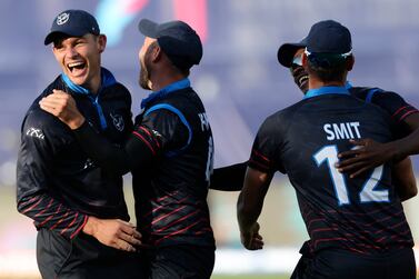 Namibia's Gerhard Erasmus, left, celebrates with teammates after they win over Sri Lanka during their T20 World Cup Cricket match in Geelong, Australia, Sunday, Oct.  16, 2022.  (AP Photo / Asanka Brendon Ratnayake)