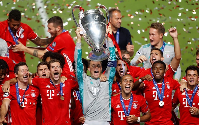 Bayern Munich goalkeeper Manuel Neuer lifts the Champions League trophy. AFP