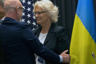 German Defence Minister Christine Lambrecht (right) and Ukrainian Minister of Defence Oleksii Reznikov at the US airbase in Ramstein, western Germany. AFP