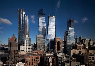 In this Dec. 4, 2018 photo, skyscrapers rise above Hudson Yards in the west side of Manhattan borough of New York. New York City Mayor Bill de Blasio presides over a city that's known for its skyscrapers but he is no fan of the glass towers that have transformed the Manhattan skyline in recent decades. (AP Photo/Mark Lennihan)