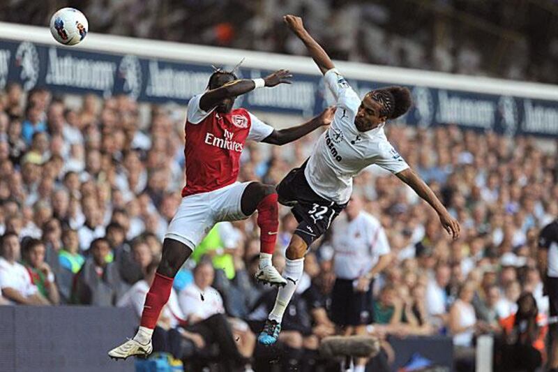 Arsenal right-back Bacary Sagna, left, clashes in mid-air with the Tottenham left-back Benoit Assou-Ekotto at White Hart Lane.

Anthony Devlin / PA / AP Photo