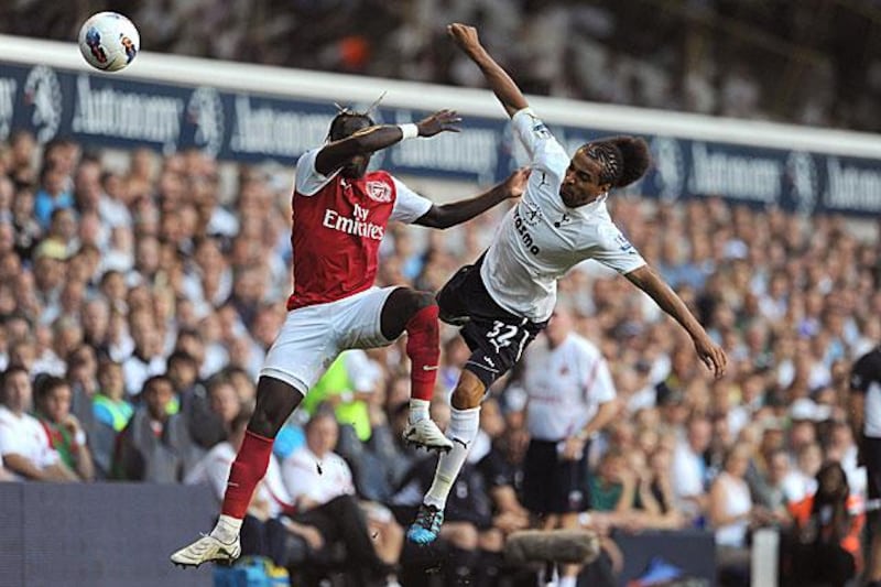 Arsenal right-back Bacary Sagna, left, clashes in mid-air with the Tottenham left-back Benoit Assou-Ekotto at White Hart Lane.

Anthony Devlin / PA / AP Photo
