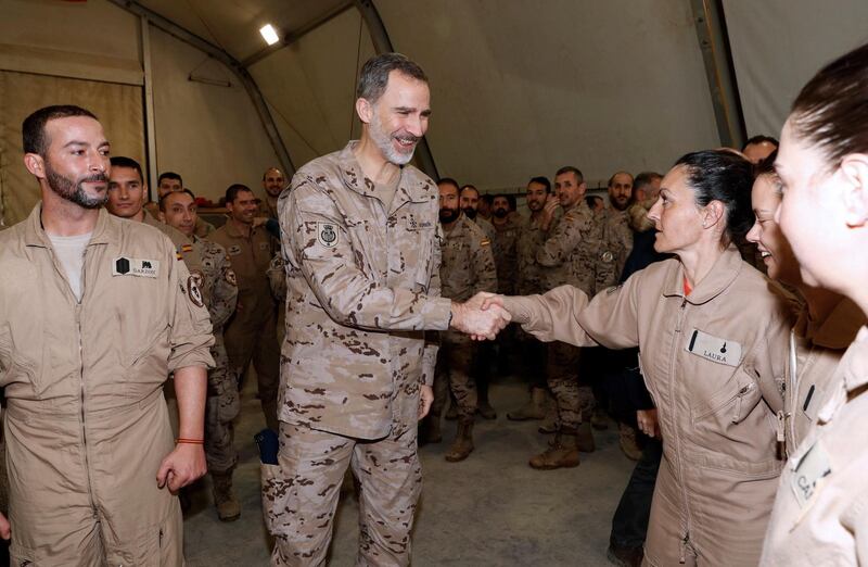 King Felipe greets Spanish troops during his visit to their military base in Baghdad. EPA