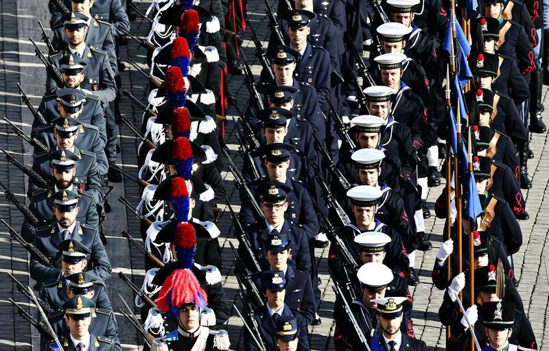 Italian military forces march as they arrive in St Peter’s square before Pope Francis leads the Easter mass at the Vatican. Alessandro Bianchi / Reuters