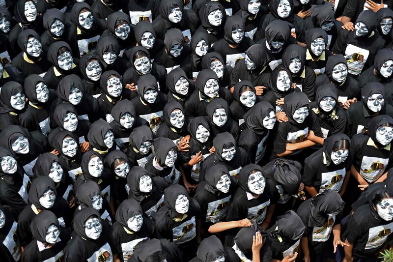 Students with painted faces gather in Chennai in support of the lunar mission. AFP