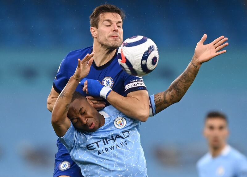 City's Raheem Sterling and Cesar Azpilicueta of Chelsea battle for the ball. Reuters