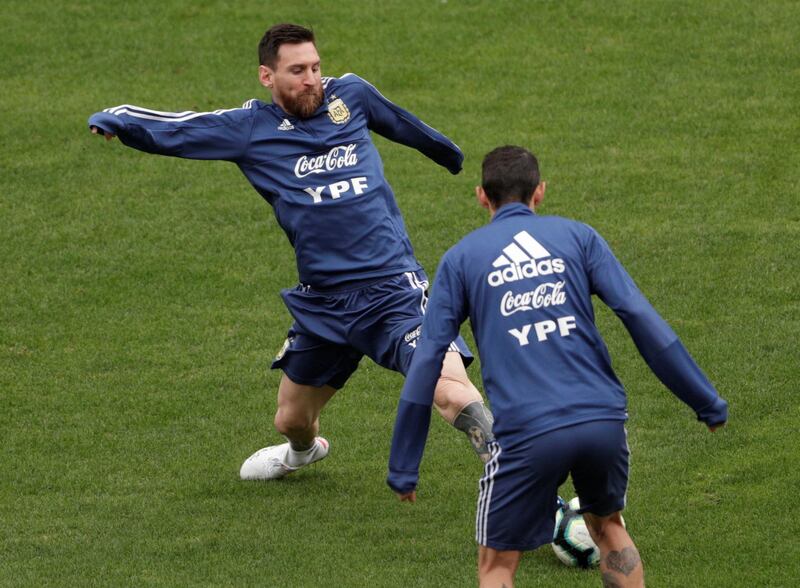 Argentina's Lionel Messi and Angel Di Maria during training. Reuters