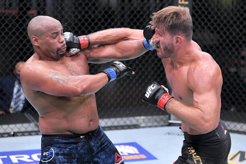 LAS VEGAS, NEVADA - AUGUST 15: (R-L) Stipe Miocic punches Daniel Cormier in their UFC heavyweight championship bout during the UFC 252 event at UFC APEX on August 15, 2020 in Las Vegas, Nevada. (Photo by Jeff Bottari/Zuffa LLC)