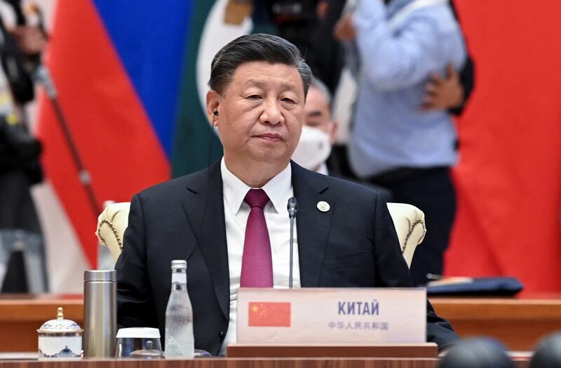 Mr Xi delivers a speech to the organisation, which was founded in 2001. Reuters