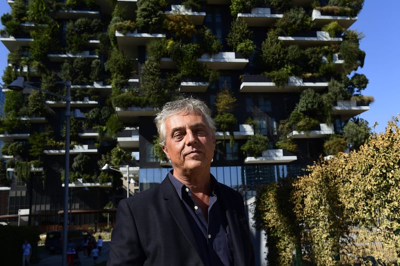 TO GO WITH AFP STORY BY CELINE CORNU - Italian architect and urban planner Stefano Boeri poses on September 5, 2017 at the architectural complex designed by Studio Boeri,  the "Bosco Verticale" (Vertical Forest) in the Porta Nuova area in Milan.  / AFP PHOTO / MIGUEL MEDINA