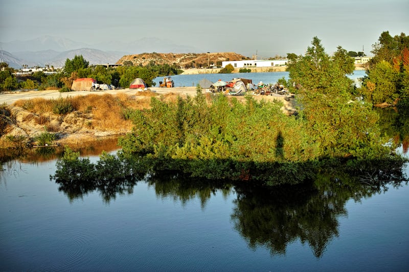 A group of residents sleep in the rough on the banks of Arcadia's El Monte Water Conservation Park in East Los Angeles County. Photo: Creative Commons