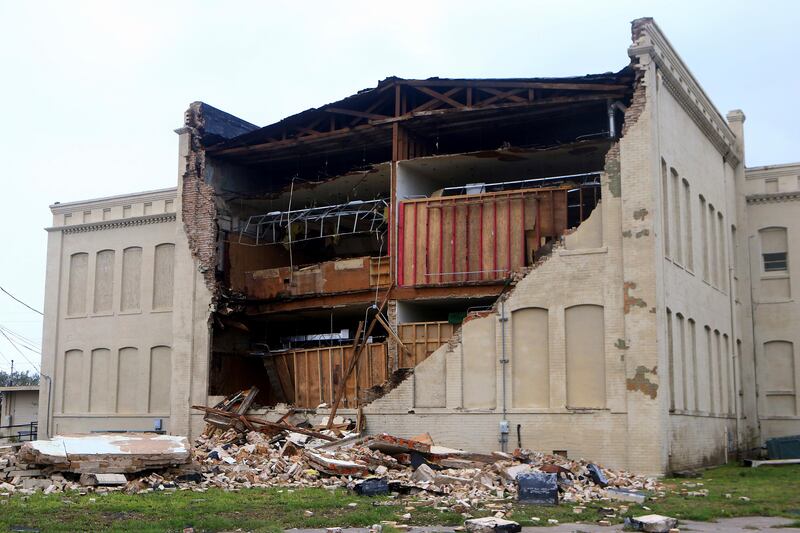 Debris lies on the ground after a building was destroyed by Hurricane Harvey in Aransas Pass, Texas. Gabe Hernandez/Corpus Christi Caller-Times via AP