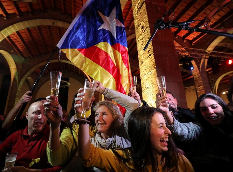 People react to results in Catalonia's regional elections at a gathering of the Catalan National Assembly (ANC) in Barcelona, Spain December 21, 2017. REUTERS/Albert Gea