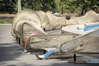Circle Fence, a hammock-like rope that encircles The Unisphere in Corona Park, Queens. Courtesy Public Art Fund, NY