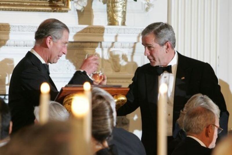 President George W Bush and King Charles, who was Prince of Wales at the time, toast one another during a dinner at the White House in 2005. Photo: White House