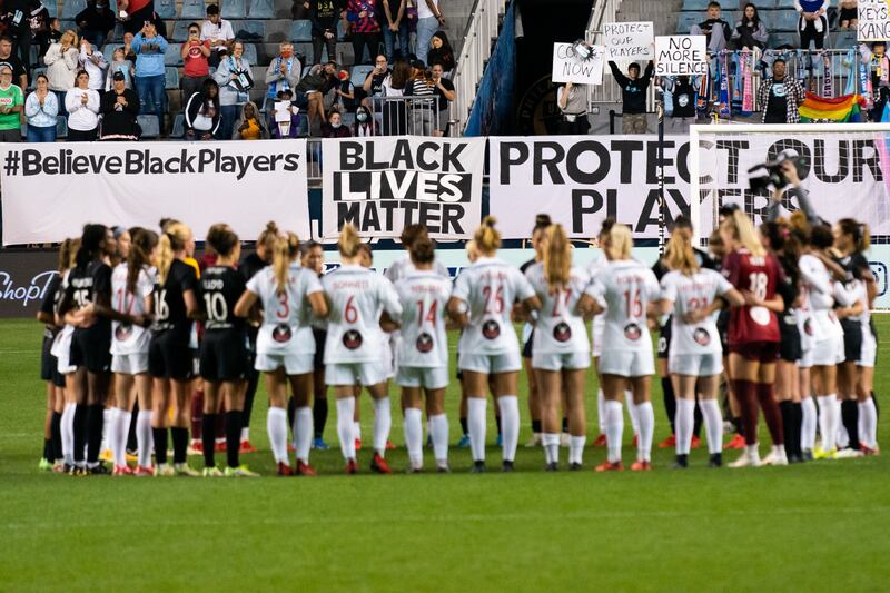 Players stop the match during the first half of a NWSL soccer match between NJ/NY Gotham FC and the Washington Spirit in a protest at Subaru Park, Chester, Pennsylvania, USA. Reuters
