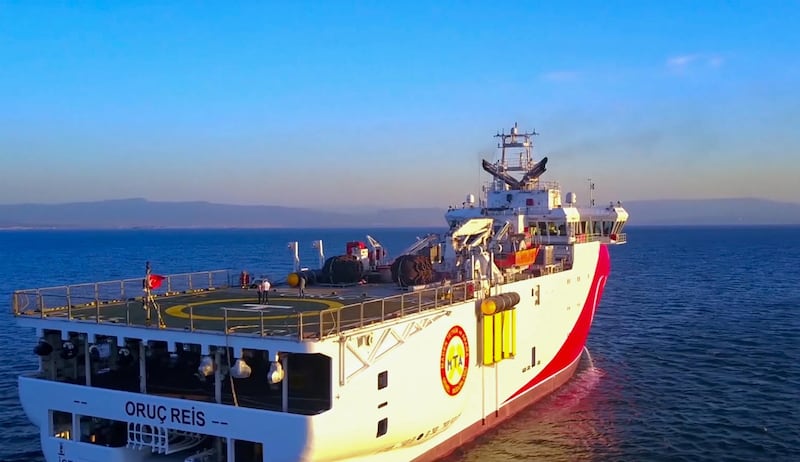 This handout photograph released by the Turkish Defence Ministry on August 12, 2020, shows Turkish seismic research vessel 'Oruc Reis' heading in the west of Antalya on the Mediterranean Sea. - Greek Prime Minister on August 12, 2020 urged Turkey to show "logic" in a naval showdown in the Eastern Mediterranean over energy exploration which he warned could lead to a military accident. Tensions were stoked on August 10 when Ankara dispatched the research ship Oruc Reis accompanied by Turkish naval vessels off the Greek island of Kastellorizo in the eastern Mediterranean. (Photo by Handout / TURKISH DEFENCE MINISTRY / AFP) / RESTRICTED TO EDITORIAL USE - MANDATORY CREDIT "AFP PHOTO / HO / TURKISH DEFENCE MINISTRY" - NO MARKETING - NO ADVERTISING CAMPAIGNS - DISTRIBUTED AS A SERVICE TO CLIENTS