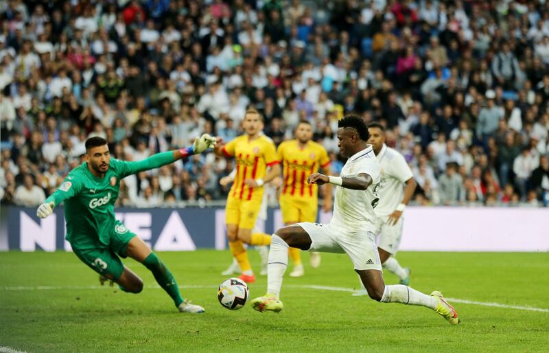 Real Madrid's Vinicius Junior scores their goal against Girona in La Liga. Reuters