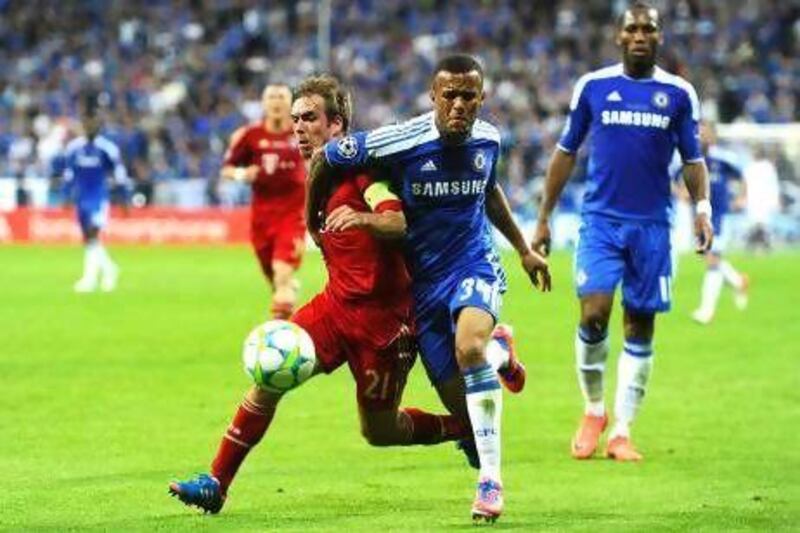 MUNICH, GERMANY - MAY 19: Ryan Bertrand of Chelsea and Philipp Lahm of Bayenr Muenchen fight for the ball during UEFA Champions League Final between FC Bayern Muenchen and Chelsea at the Fussball Arena M‡°nchen on May 19, 2012 in Munich, Germany. (Photo by Mike Hewitt/Getty Images) *** Local Caption *** 144793089.jpg