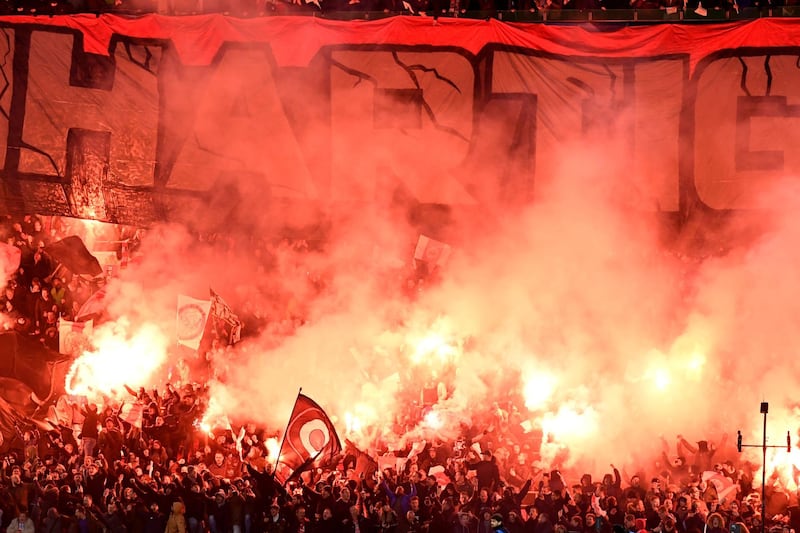 General view as fans light flares inside the Johan Cruijff Arena before the match between Ajax and Valencia. Reuters