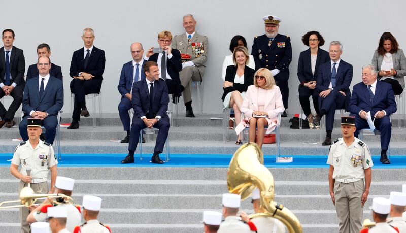 French leaders take a socially distant seat for the celebrations that this year are honouring the heroes of the pandemic. AFP