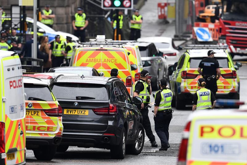 Emergency services near the Glasgow hotel where the attack happened. Getty Images)