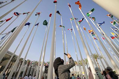 Visitors attend the closing ceremony of Expo 2020, in Dubai, on March 31. AFP