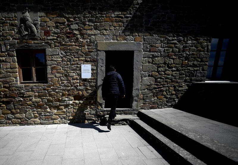 A visitor enters the house of Leonardo Da Vinci. AFP